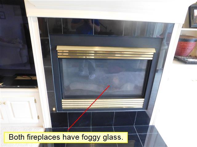 10.6 (1) The fireplace's glass door is discolored and hazed over (both basement and bedroom).