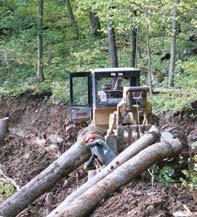 Avoid winching at large angles as the machine may tip over. Set chokers on the butt end of the log, when possible. Never set the chokers in the middle of the log.