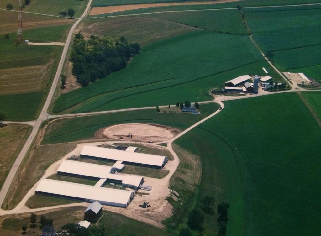 2002 Expanded dairy from 70-400 cows Purchased heifers as grew & raise on original farm site New barns/parlor Double-8 parlor 2 freestall barns Calf Barn 280 acres operating (113 hectares) Provided