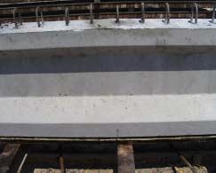 normalweight concrete. As shown in Figure 5.10, there were no voids or honeycombing which might be expected with a cohesive mix such as the 8000 psi concrete mix. Figure 5.10 Finish of Girder with 8000 psi Concrete Mix Overall, the workability performance was disappointing.