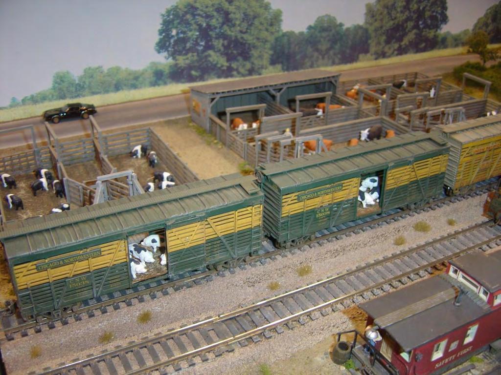 #1 - These are commercial (blue box) Athearn cattle cars that I detailed.