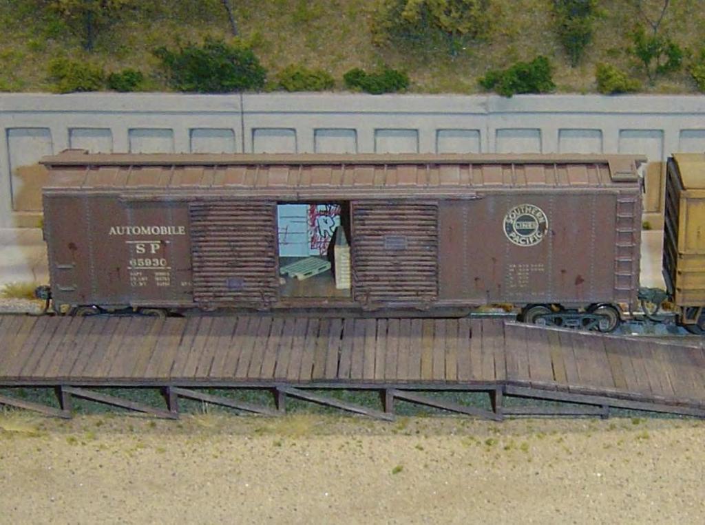 #2 - This is a commercial (blue box) Athearn 50ft double door box car that has been weathered and interior detailed with
