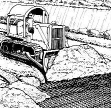 Fill can be placed and spread directly upon the geogrids with rubber tired equipment (Figure 6).