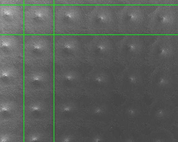 78 Diameter = 47 µm Diameter = 47 µm 10 µm Figure 3-27: Dense array of LDEs processed at 100W and 100