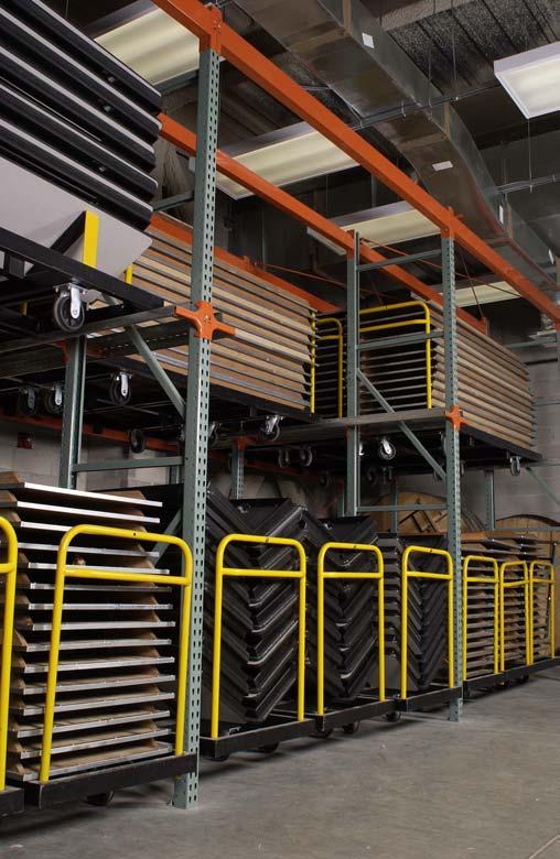 Each storage level is independent of the others so that trucks stored at floor level may be retrieved without moving the trucks stored above.