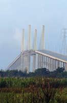 Today, the cable-stayed Veterans Memorial Bridge serves northbound traffic on Texas 87.