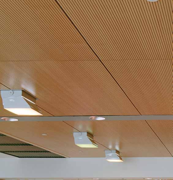 Fully grooved Solo-M panels, quarter cut slip matched maple veneer. Panels are installed in a direct mount suspension system.