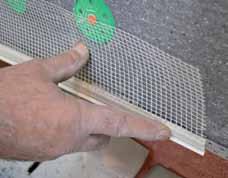 3 Place first insulation board onto base rail and