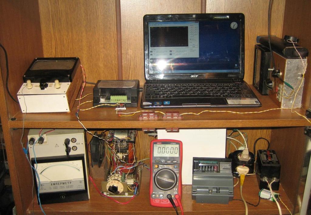 Setup Components On top from left to right: thermocouple amplifier with a power regulator, computer recorder for temperatures and count of the Geiger counter, a