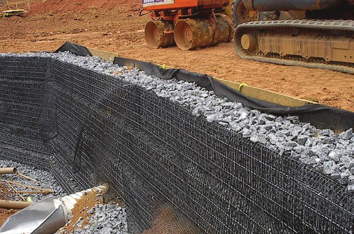 PERMANENT WELDED WIRE MESH WALLS ROCK FACED WELDED WIRE MESH WALL The combination of a welded wire mesh facing, biaxial grid wrap and uniaxial geogrid soil reinforcement produces a rock aggregate