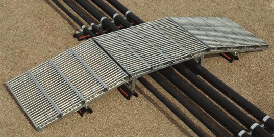 The cross-over design offers safe passage over existing cabling, piping, cable tray or any other
