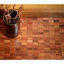 WOOD MOSAIC 2) ASPHALT TILES: These are a close relative of linoleum because of the asphalt used in their construction.