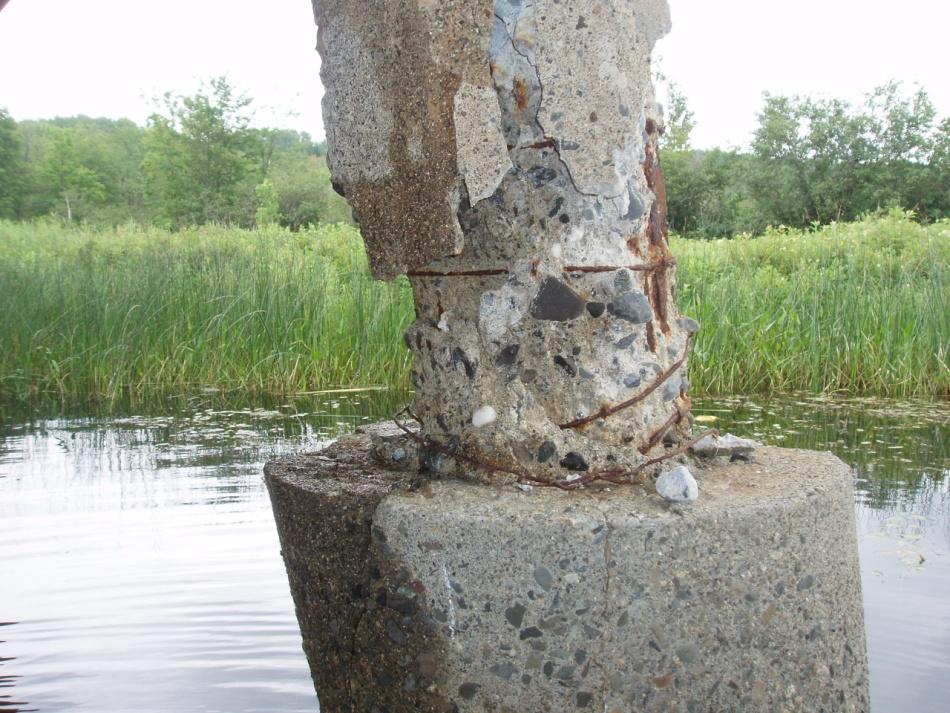 Fig. 18 Existing concrete pile requiring repair Steel beams were used for support with a combination of short pedestal columns cut from steel H pile sections, and concrete blocks cast to