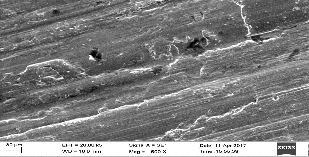 and unclad surface is tabulated in Table 1. The worn surface was observed through scanning electronic microscope. At low loads a imperceptible wear in the form of abrasion and adhesion was noticed.