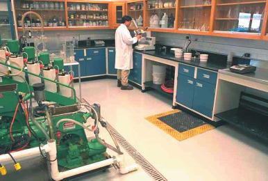 Figure 2. The pilot plant s testing laboratory evaluates pulp samples and final paper products during trial runs.