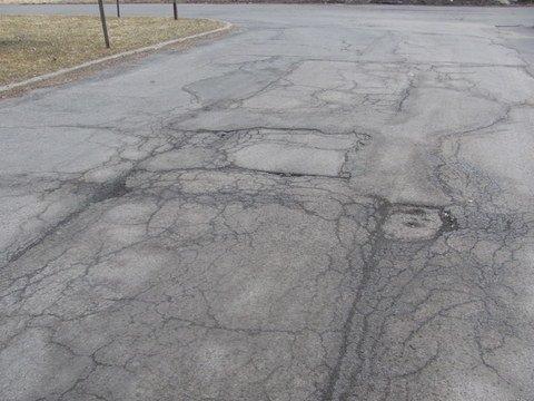 Significant pavement cracks and patches