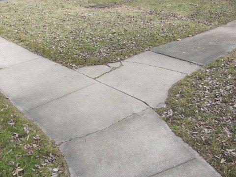 Cracked sidewalk sections
