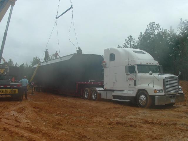 Adequate road access must be available as tanks are shipped on lowboy trucks; trailer clearance is at a minimum, and the trucks can exceed 80