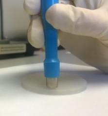 Using an 8-mm biopsy punch, first punch the plastic to create a disk that will protect the hydrogel