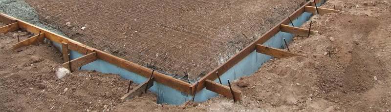 A 4-inch thick base of 1/2 inch or larger clean aggregate shall be provided with a vapor retarder in direct contact with concrete and a concrete mix