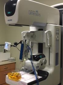 The TVAB system is mounted onto the mammogram equipment s C-arm and locked