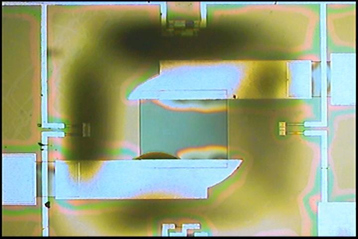 You can see the diaphragm bend down and evaluate the alignment of the hole on the back side of the wafer with