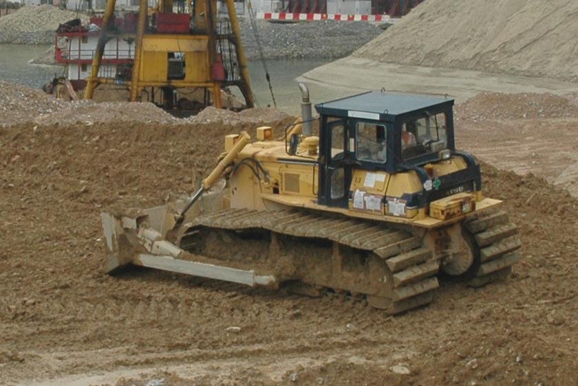 - usually done by the use of bulldozer, scraping or other excavating