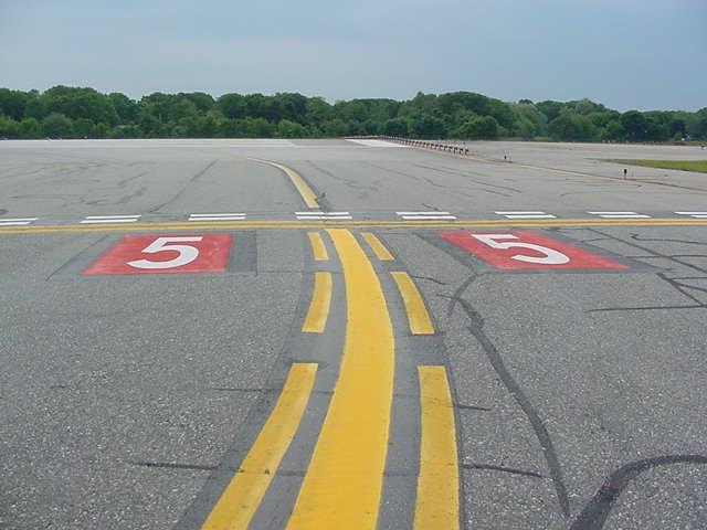 These three marking proposals were implemented at every taxiway/runway intersection (Figure 3-2).