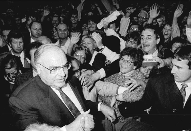 FOCUS : Helmut Kohl and German reunification Source 3 : Helmut Kohl in 1990 In 1982 Helmut Kohl became the Chancellor of West Germany and under his leadership the economy began to recover from the