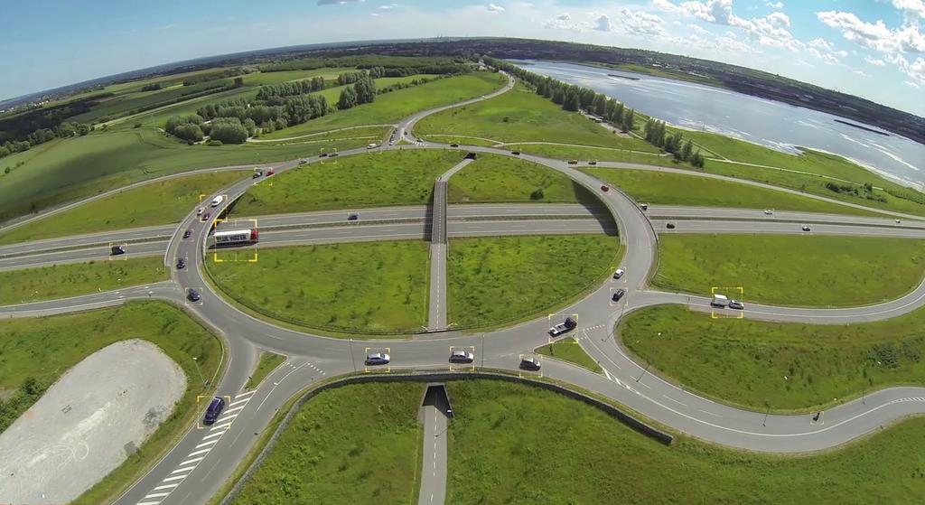 Beta version of software automatically counting traffic in a large roundabout north of Aarhus, Denmark. The software detects, marks and follows every vehicle entering and exiting the roundabout.