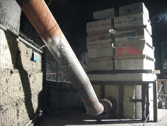 The fire loading in the testing tunnel according to RWS was applied for 60 minutes. In the test specimen the residual humidity was limited to 4%. Test Arrangement A reinforced concrete slab with a 2.