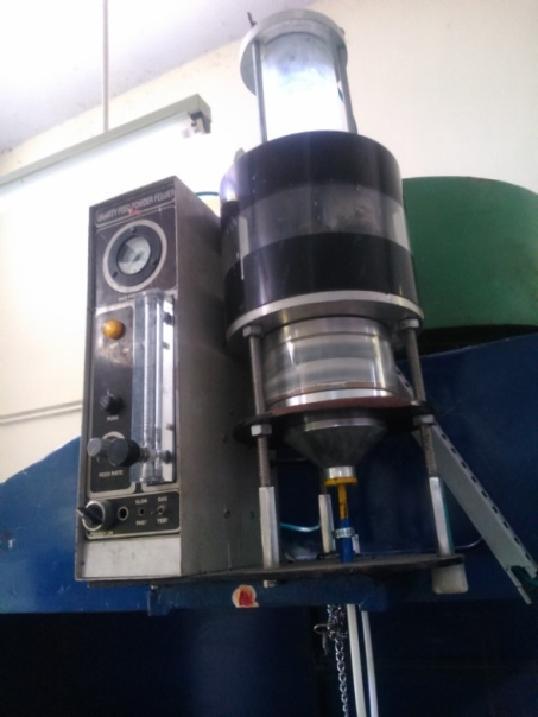gravity feed powder feeder to supply metal powder to the coaxial nozzle is shown in the figure 4. There are three different methods of powder injection: a.