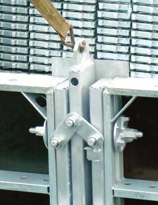 After removing the bowstrings, stiffening beams, brackets and other wall mounting equipment the internal segment is attached to the slings and transported vertically.