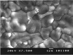 A thin buffer layer of NaCl was evaporated on a glass substrate, then a polyimide layer was spin-coated and cured at about 430 C.