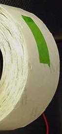 5 Remove the tape from the RFID Tag roll (Figure 5).