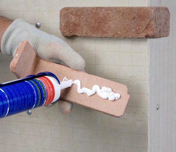 Be sure to countersink the screws so the brick can bond properly to the board. At the corners, ensure the fiberboard meets at the ends so that there are no gaps.