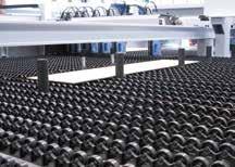 2 1 Powerful feeding system Panels are fed via an electrohydraulic four-column lifting table Automatic determination of book height