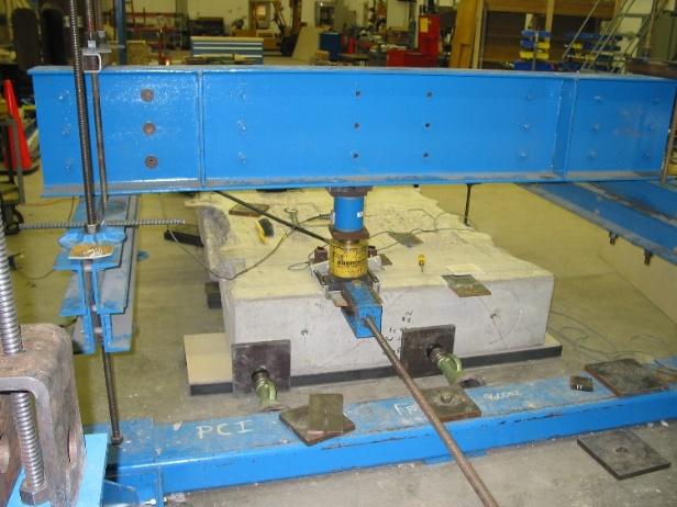 Figure 5 Overall view of the test set-up showing both bearing and shear load application.