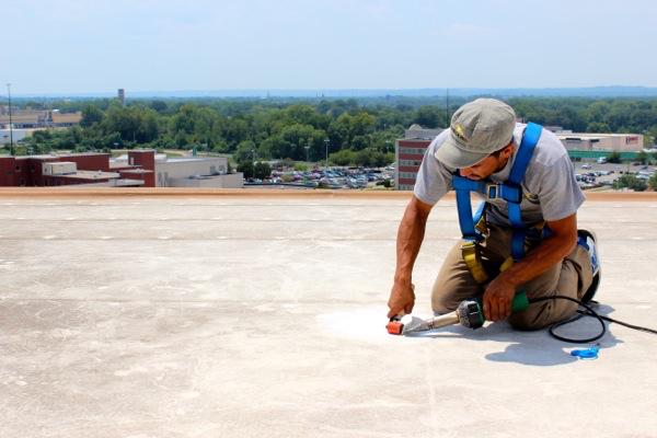 Budget more for large sized flat roof repairs and maintenance projects which require more flat roofing material and more labor to get building dry.