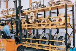 Pallets are loaded onto a shuttle at the front of the lane, which transports the pallet down to the