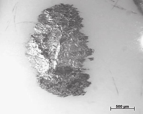 1346 Fig. 6. Counter specimen of the tribological test a) aluminium alloy AlMg 9 b) a composite layer obtained from a 1.8 kw power laser beam Fig. 7.