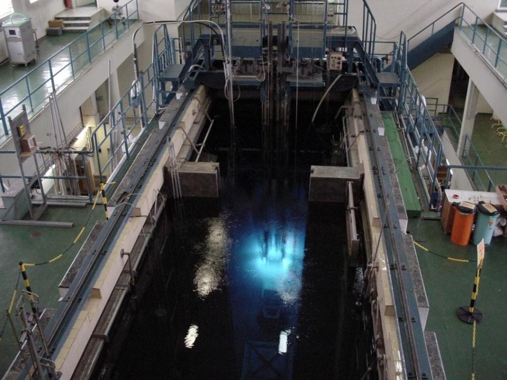 The Greek Research Reactor (GRR-1) of INRaSTES 5 MW open pool type MTR-type fuel elements Be reflectors