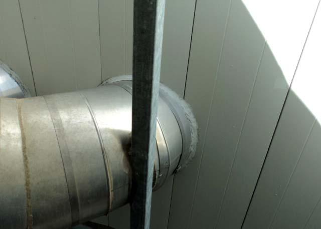 Seal between ductwork and drainage plane behind metal panels is typically a concern.