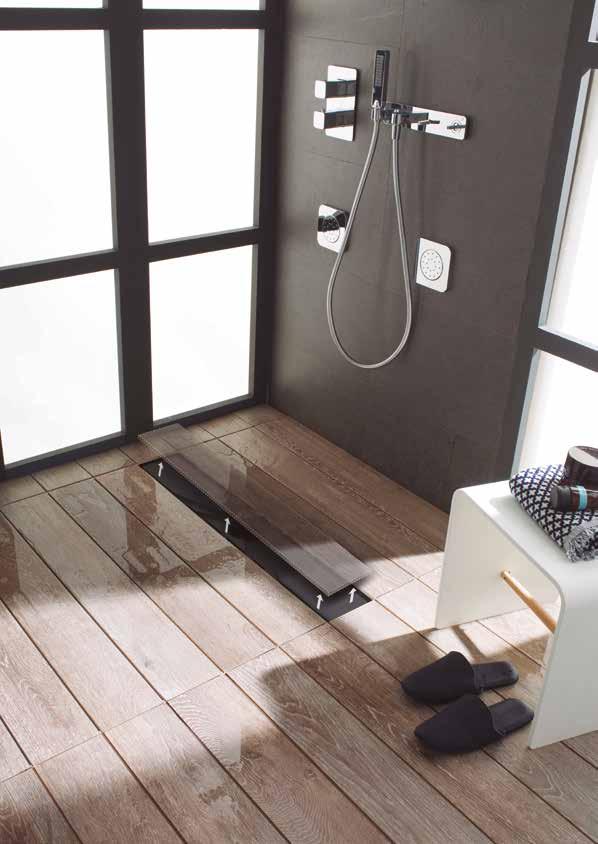 Shower trays shower deck system New shower tray concept with concealed drain for the most exclusive bathrooms.