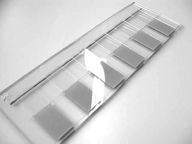 Single cantilever wedge test specimen, glass slides bonded with acrylic pressure sensitive adhesive The test geometry in Fig.
