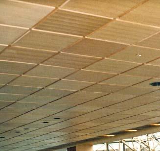 New World flat or curved panels are real-wood veneer-faced ceiling tiles that are easy to install. Factory refinished with clear lacquer or stained to match your sample.