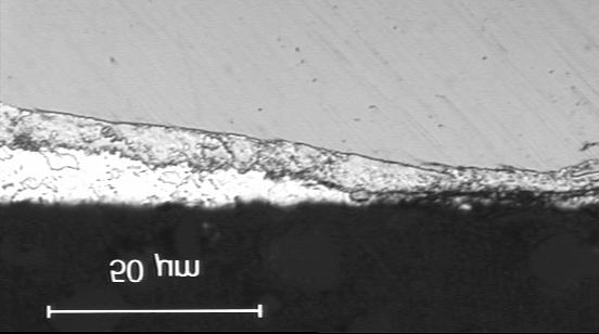 Figure 1: A rough substrate surface results in Zn-Fe alloy outbursts in the coating.