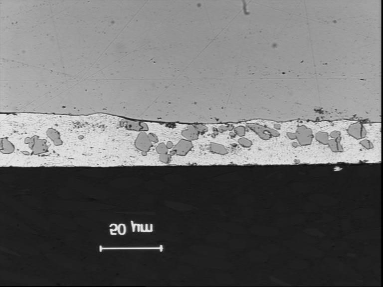 Figure 7: Large dross particles picked up in coating during GA to GI transition. Figure 6: Top dross particles entrapped in the coating due to pick-up of bath surface skimming by the coating.