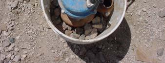Dewatering controls consist of a gravel filter provided on the suction end of a pump to reduce the pumping of sediment, a riprap pad at the discharge end of the pump for erosion protection, and a