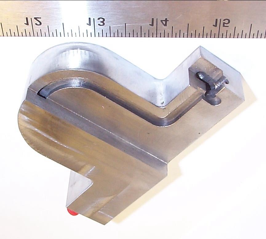 Milling a channel. Fig. 8. Channel filled with support material. Fig. 9. Channel covered with sheet metal. 10. Finished 3-D part.